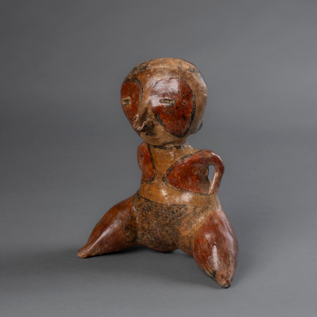 A Pre-Columbian terracotta figure (1 of 4)