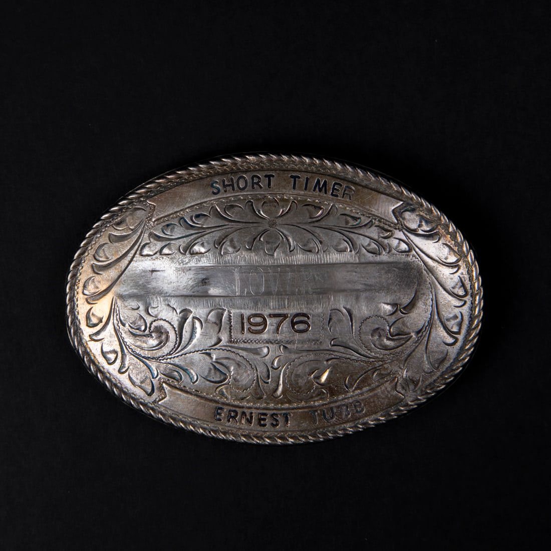 An Ernest Tubb silver belt buckle (1 of 2)