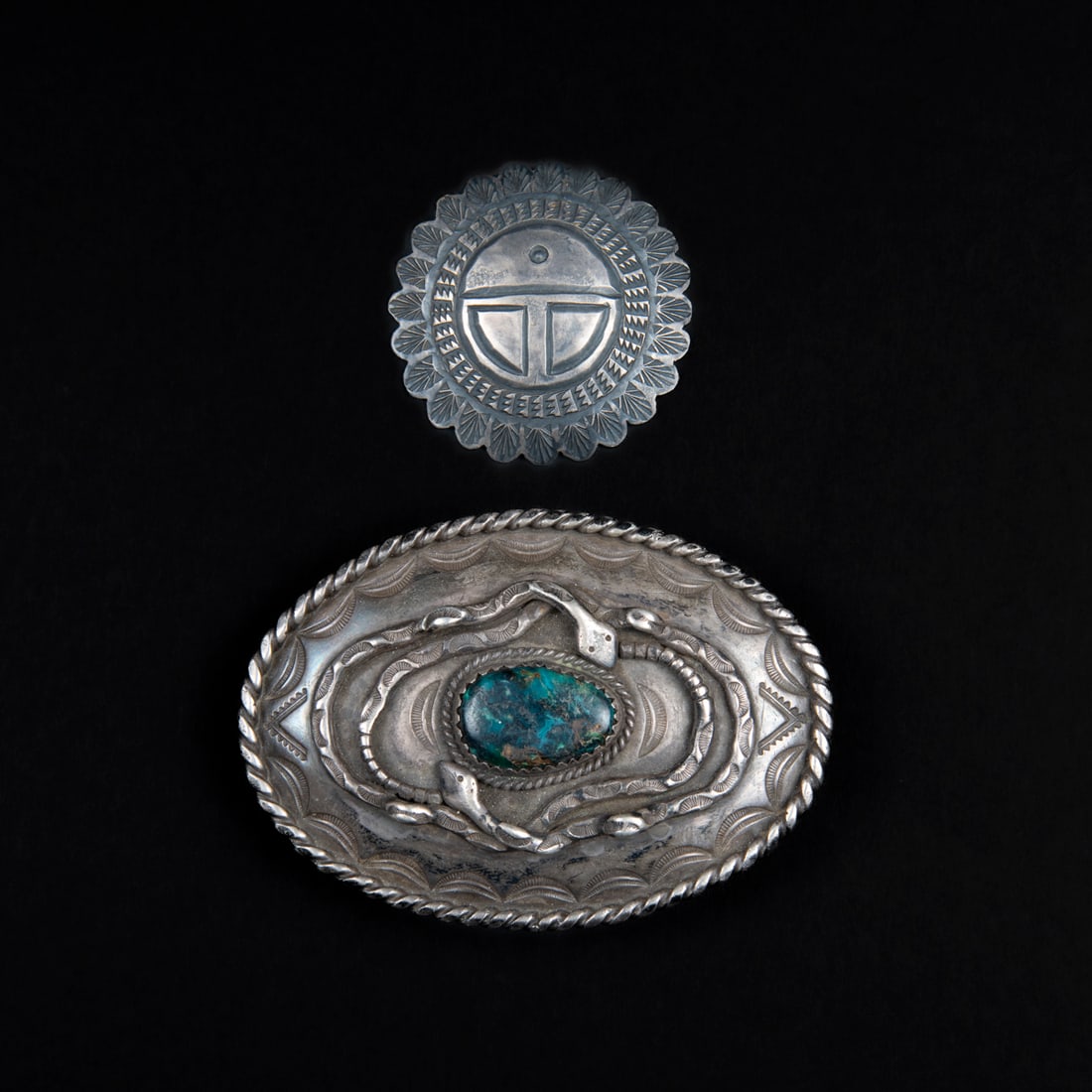 A silver Buffalo buckle and pin (1 of 2)