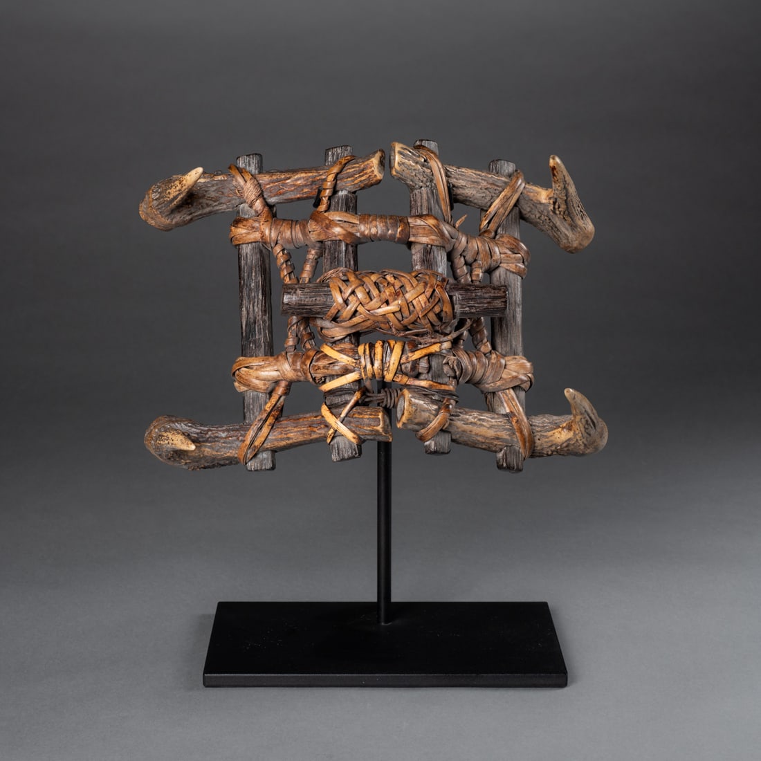 An Indonesian horn pack animal saddle: Constructed from animal horns, tied together with rattan, mounted on a custom metal base. Ht. 7 1/2, wd. 12 in. Provenance: Private collection, Albuquerque, NM; John Whelan Fine Art, Boulder, CO.