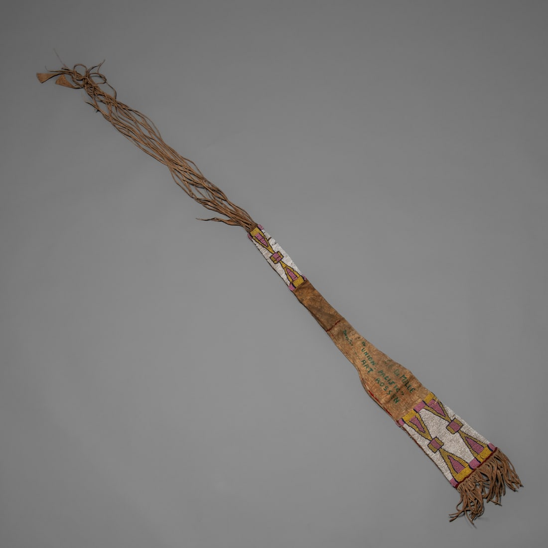 A Northern Plains beaded gun case: Featured in the movie “Union Pacific”, 1939, directed by Cecil B. DeMille and Arthur Rossen. The case is made of hide and contains two beaded panels, one at the top and the other near the