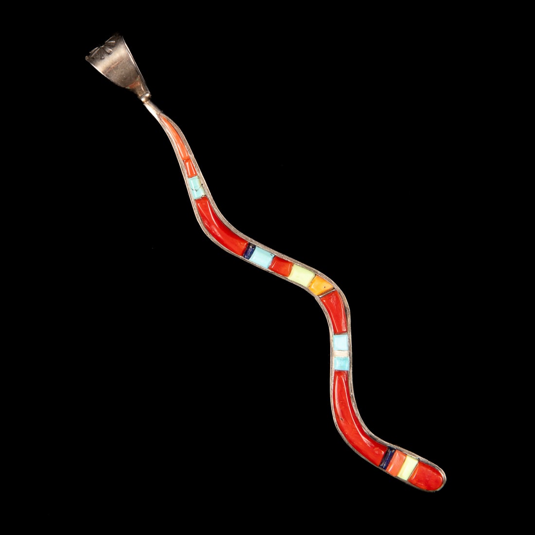 A David Tune inlay snake pendant: The Sterling silver pendant in the form of a snake with turquoise, coral and jet inlay, signed "David Tune," and marked "Sterling." Lg. 4 1/2 with bail, wd. 1/4 in. Gross weight approximately 18g. Dav