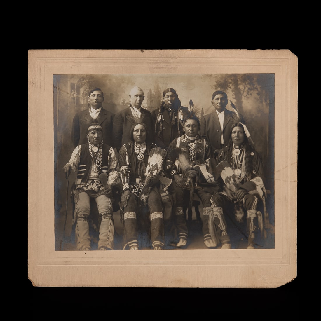 A large-format 19th-century albumen photograph depicting a group of Osage men (1 of 2)