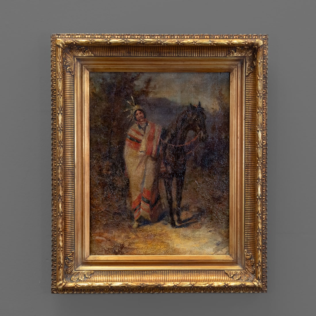 A Western oil on canvas painting (1 of 2)