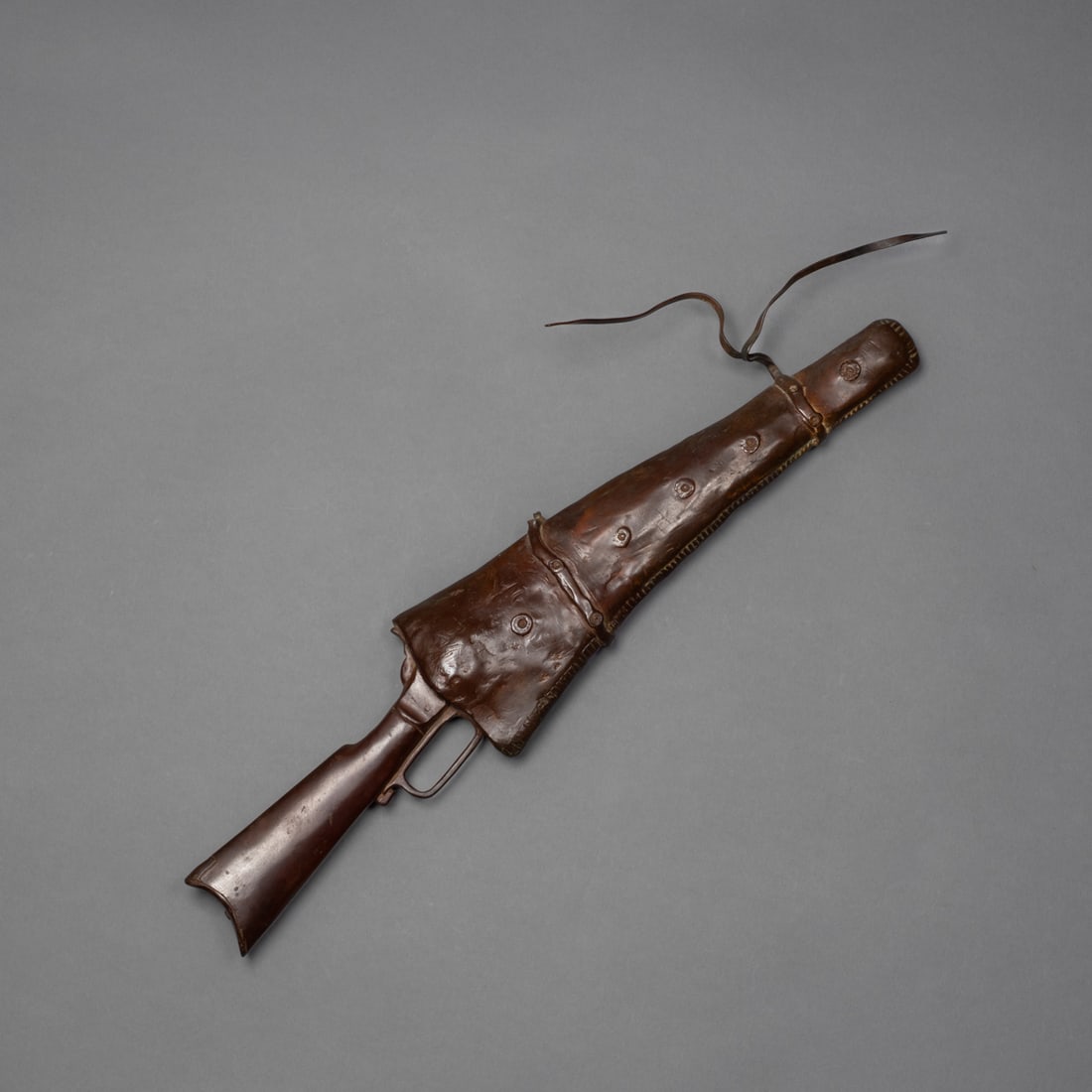 Arnold Goldstein bronze Winchester in scabbard (1 of 3)