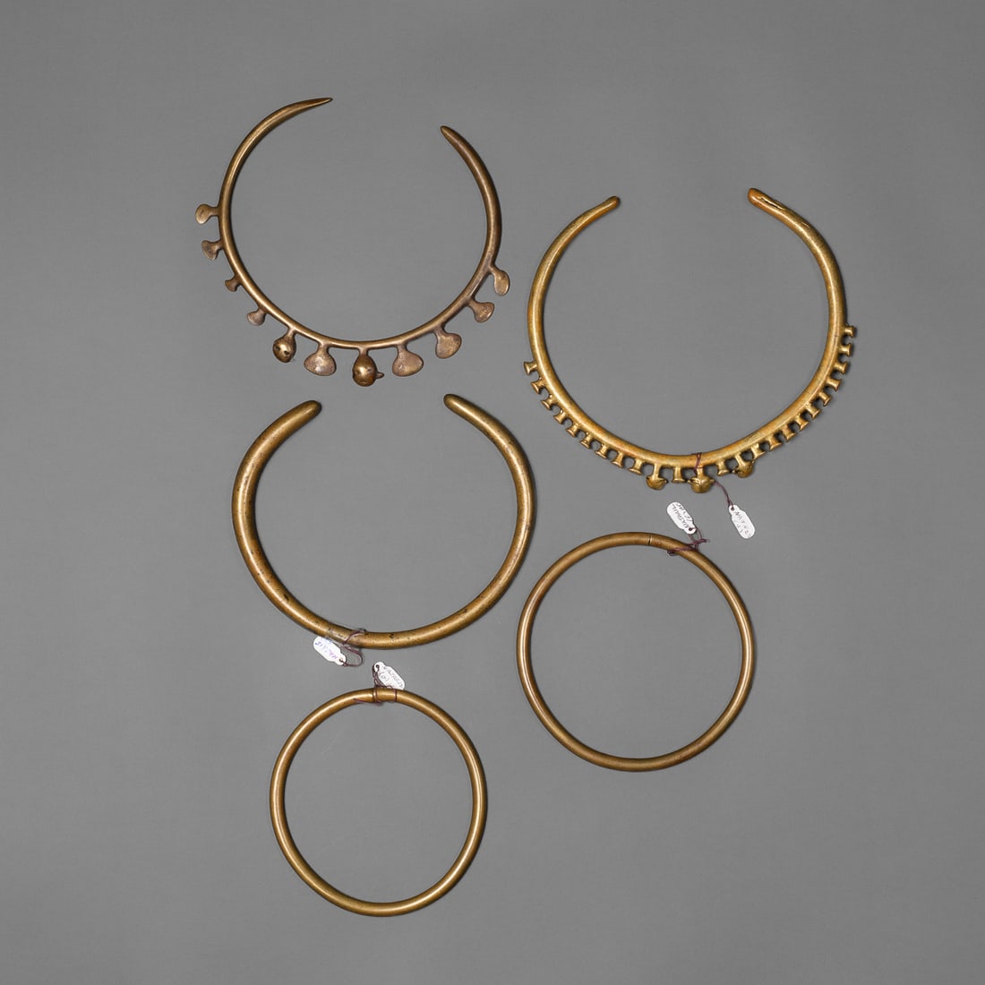 Five Naga brass torques (1 of 2)