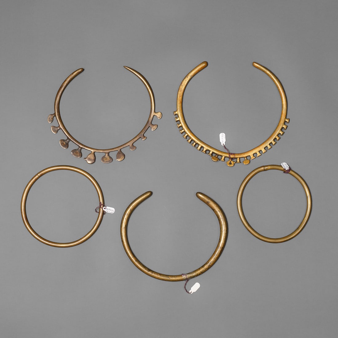 Five Naga brass torques - 2
