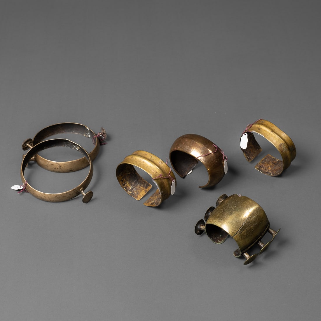 Six brass Naga arm ornaments (1 of 3)