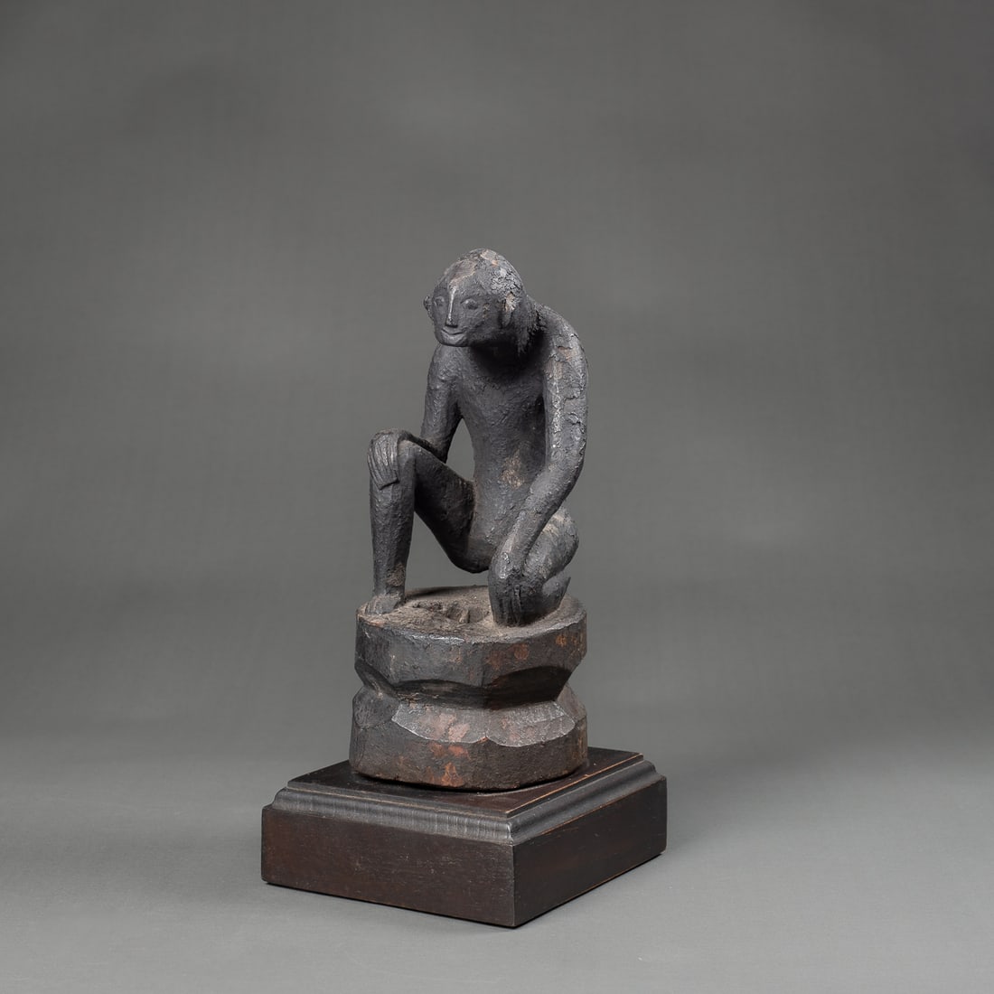 A Philippines wood figure: Hi’pag or ha’pag ritual sculpture, Northern Luzon, Cordillera, Ifugao peoples, regarded as a magical and protective object. The crouching figure with hands to knees, the head extended with simple