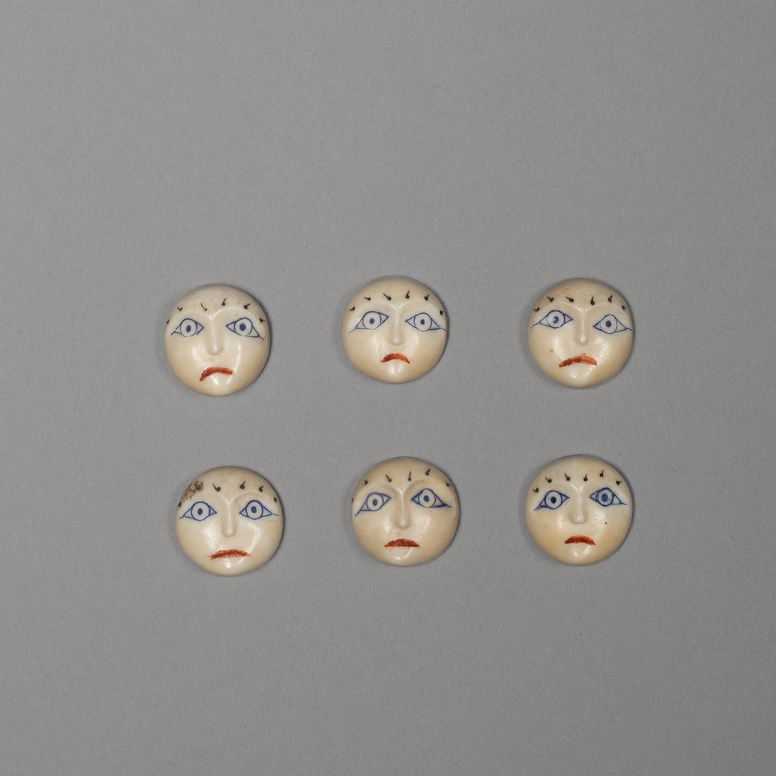 Six Carved Inuit Mask Face Effigy Buttons (1 of 2)