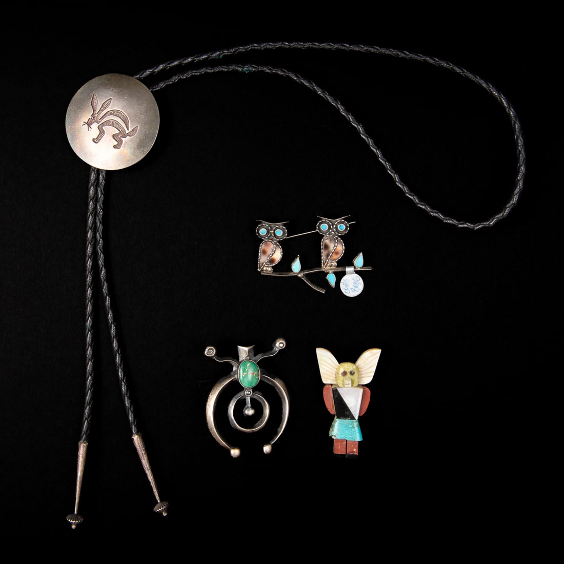 Four Vintage/Antique Southwestern silver jewelry pieces: A wonderful estate lot of four pieces of vintage/antique Native American Southwestern jewelry, believed to represent Hopi, Zuni, and Navajo craftsmanship. This collection showcases classic regional mo