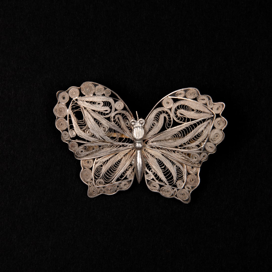 A Southwest Pueblo Indian silver filigree butterfly brooch (1 of 2)