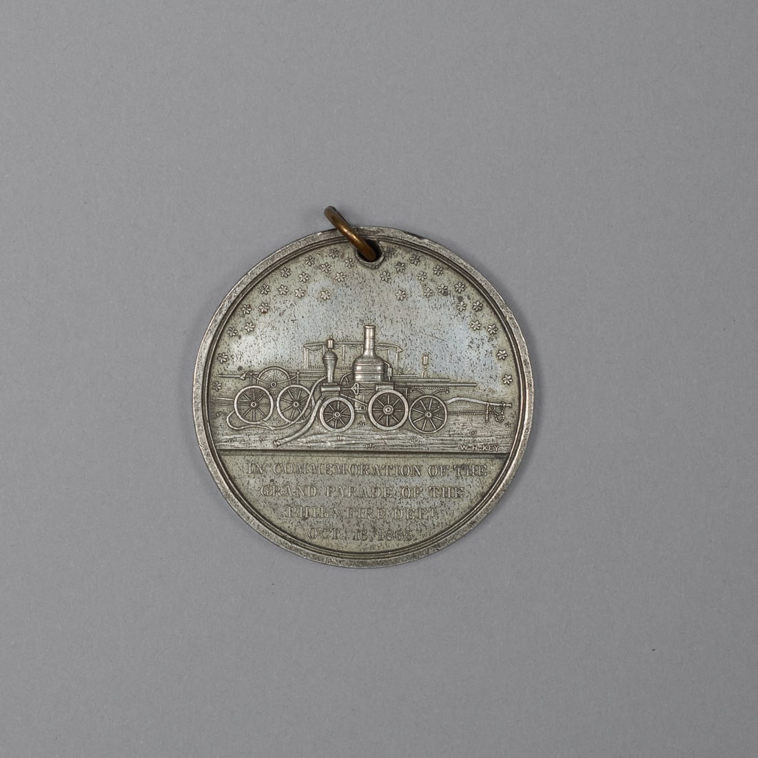 A 1865 Philadelphia Fire Department Grand Parade Medal: W.H. Key, "In Peace Firemen, In War Soldiers." A scarce 19th-century pewter (white metal) commemorative medal issued for the Grand Parade of the Philadelphia Fire Department, held October 16, 1865