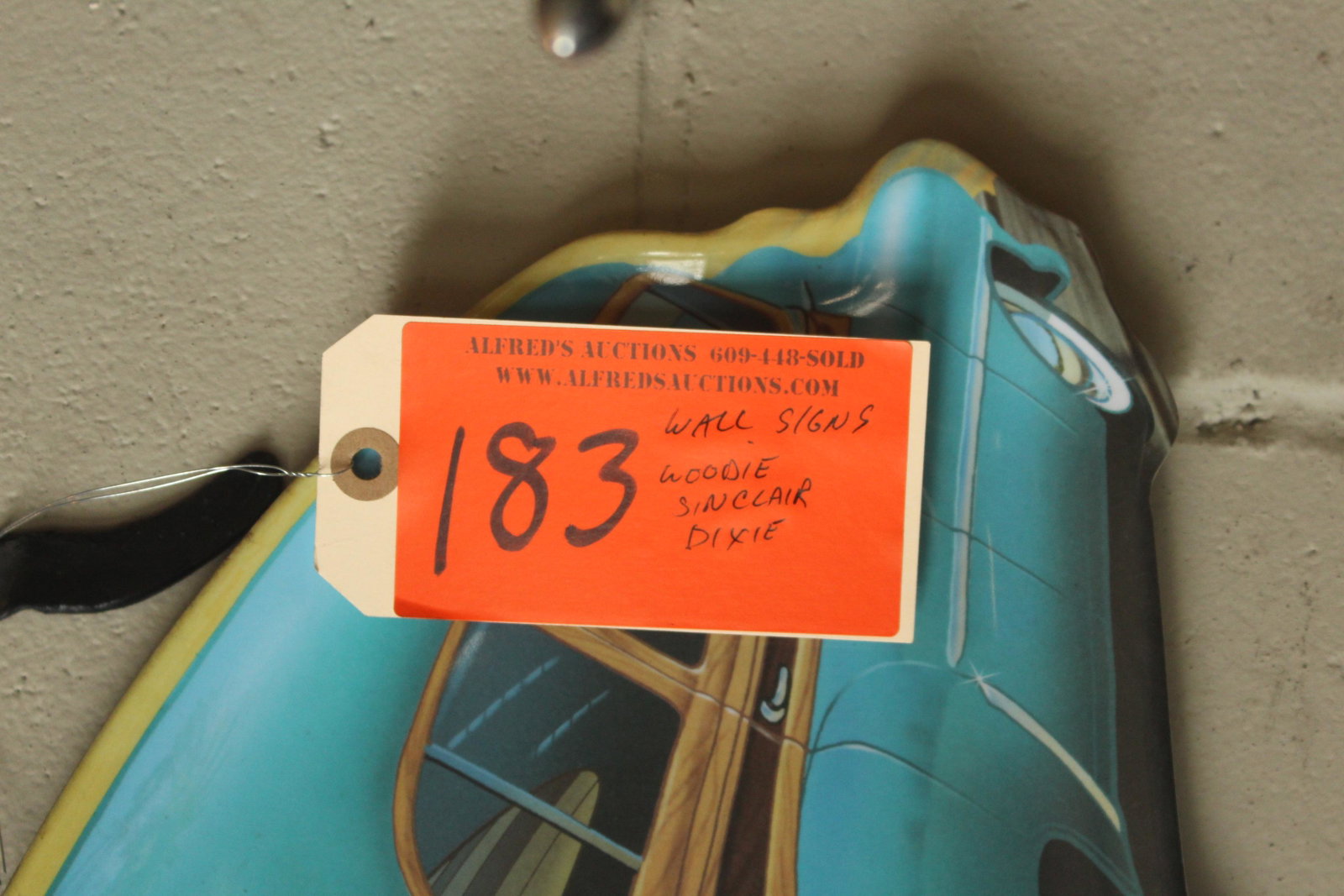 Signs: 3 signs, Woody wagon, Sinclair oil, Dixie