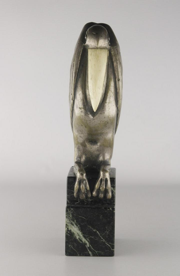 Art Deco silvered bronze pelican with marble base. Signed Bouraine: Art Deco silvered bronze pelican perched upon marble base. Origin France. Circa 1925. Some wear. Signed Bouraine in the marble. Marcel-Andre Bouraine (1886-1948) born in Pontoise, France and was pupil
