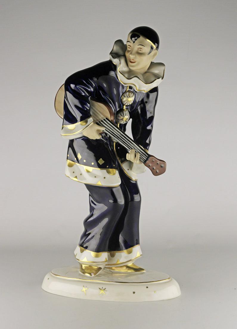 Royal Dux Bohemian porcelain figurine harlequin with guitar: Royal Dux Bohemian Czechoslovakia porcelain figurine harlequin with guitar. Origin Czechoslovakia. 1919- 1947.Perfect condition. Seals at the bottom 3633- 4. Stunning Cobalt Blue with gold accents. Th