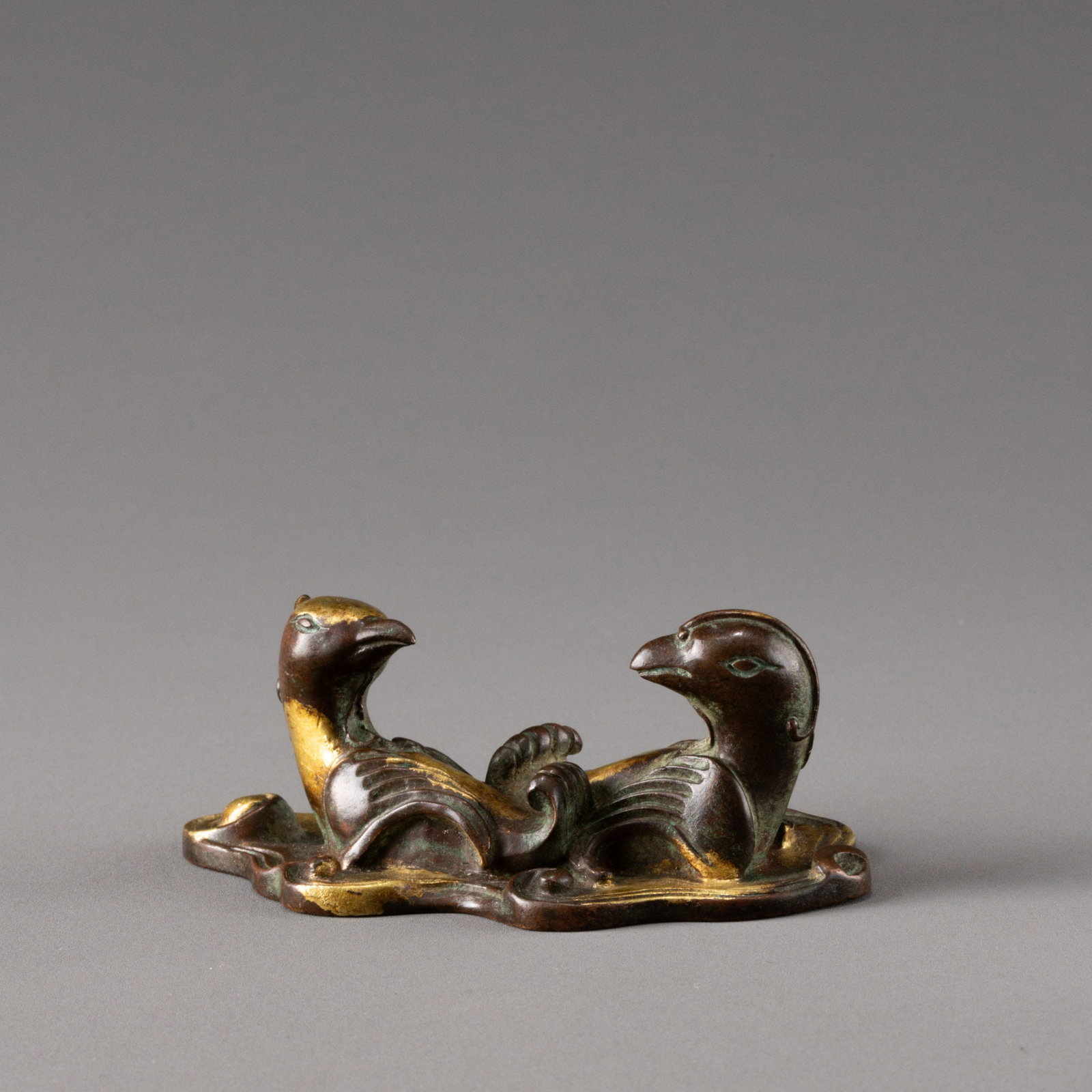 Antique bronze paperweight with gilded mandarin duck design: W: 9cm H: 3.5cm