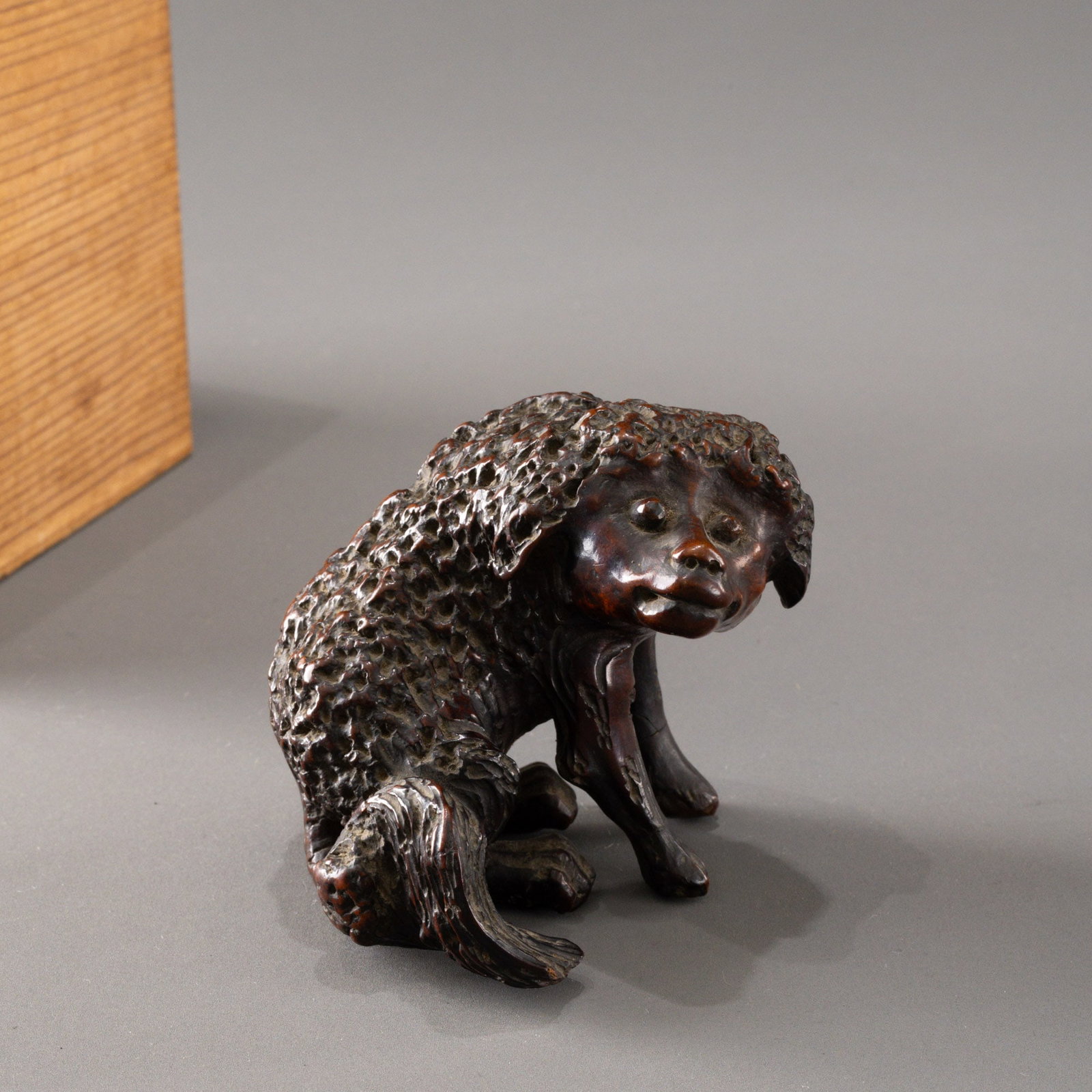 Qing Dynasty wood carving of a dog as a storage container (1 of 8)