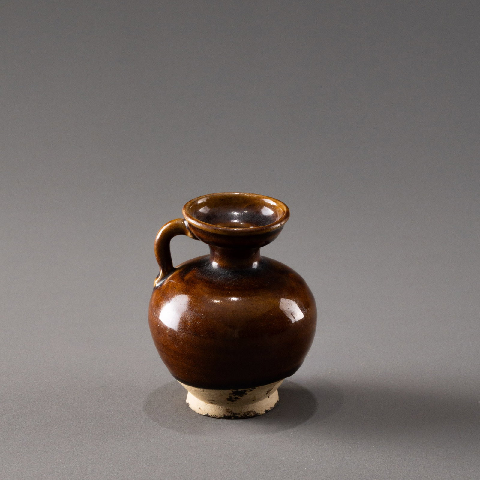 Tang Dynasty Changsha Kiln Soy Sauce Glazed Water Pitcher: H: 9cm W: 6.5cm
