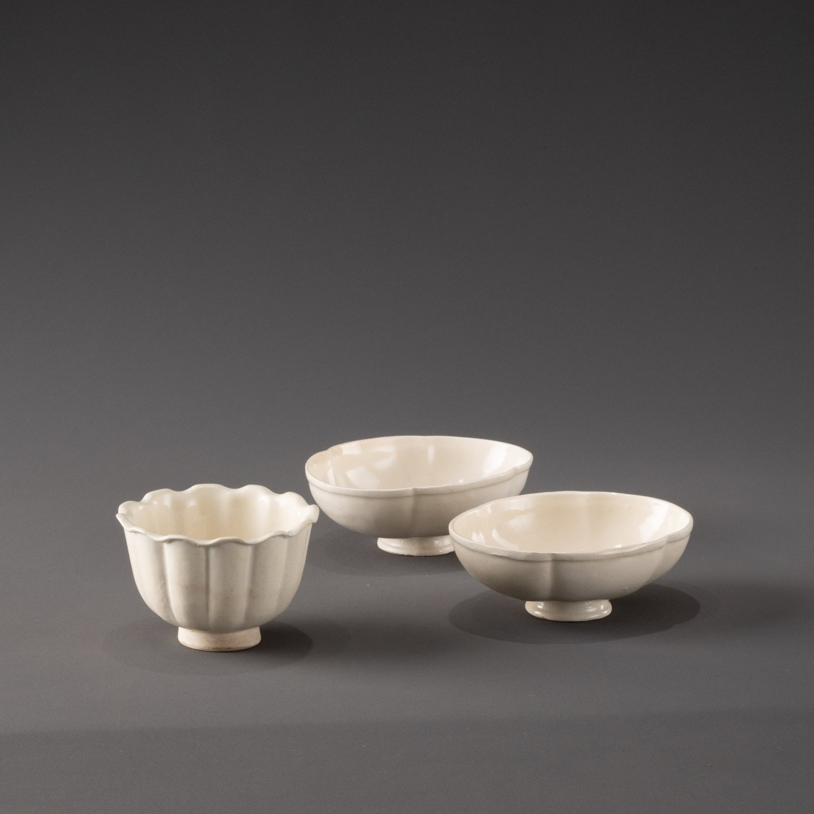 Tang Xing Kiln White Porcelain Cup with Three Dots (1 of 7)