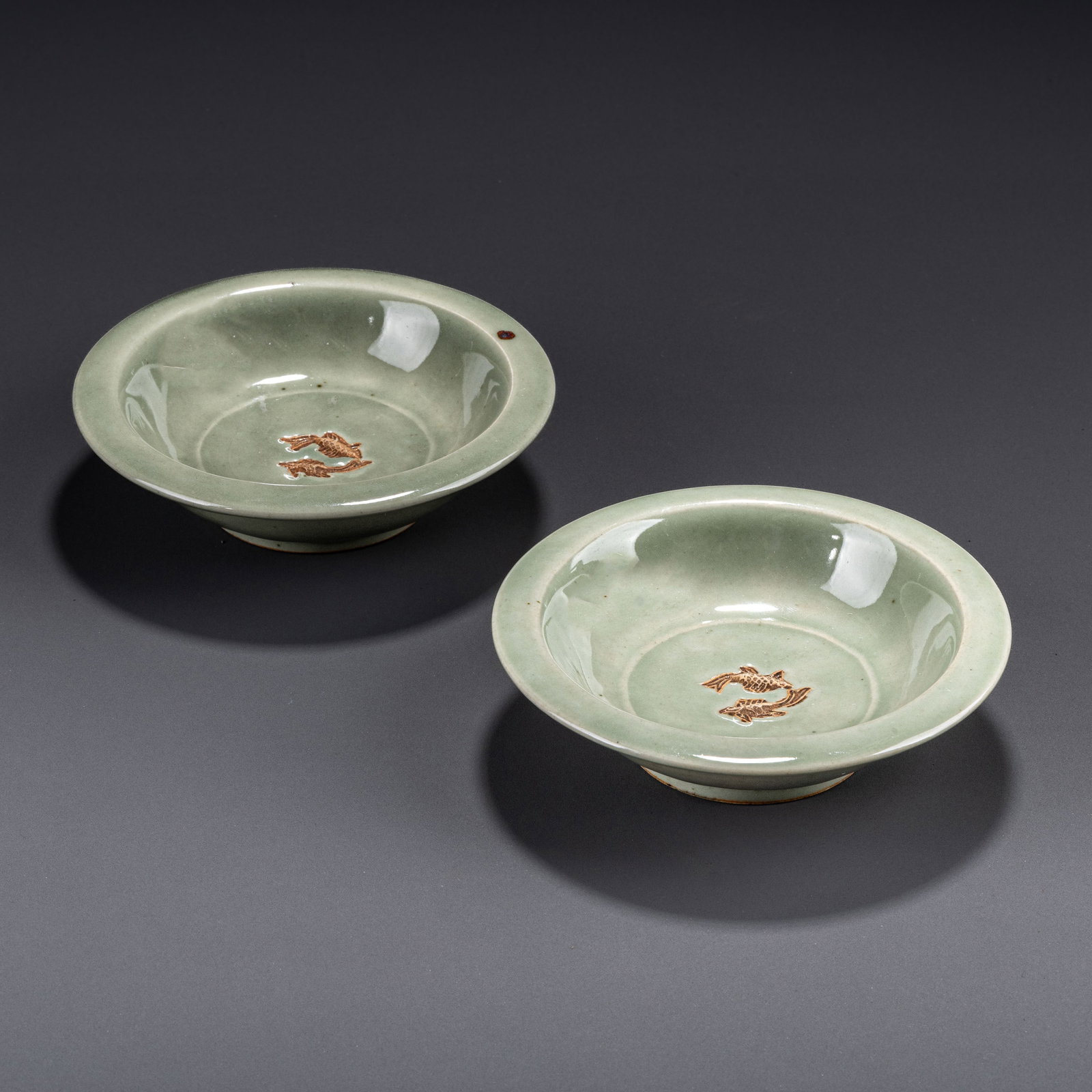 A pair of Song Dynasty Longquan ware celadon double fish plates: D: 12cm H: 3cm x2
