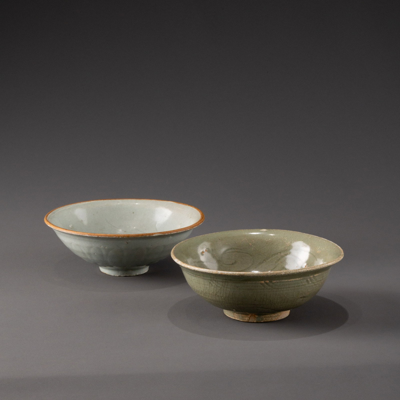 Two celadon and bluish-white porcelain bowls with incised patterns from the Song Dynasty. (1 of 9)