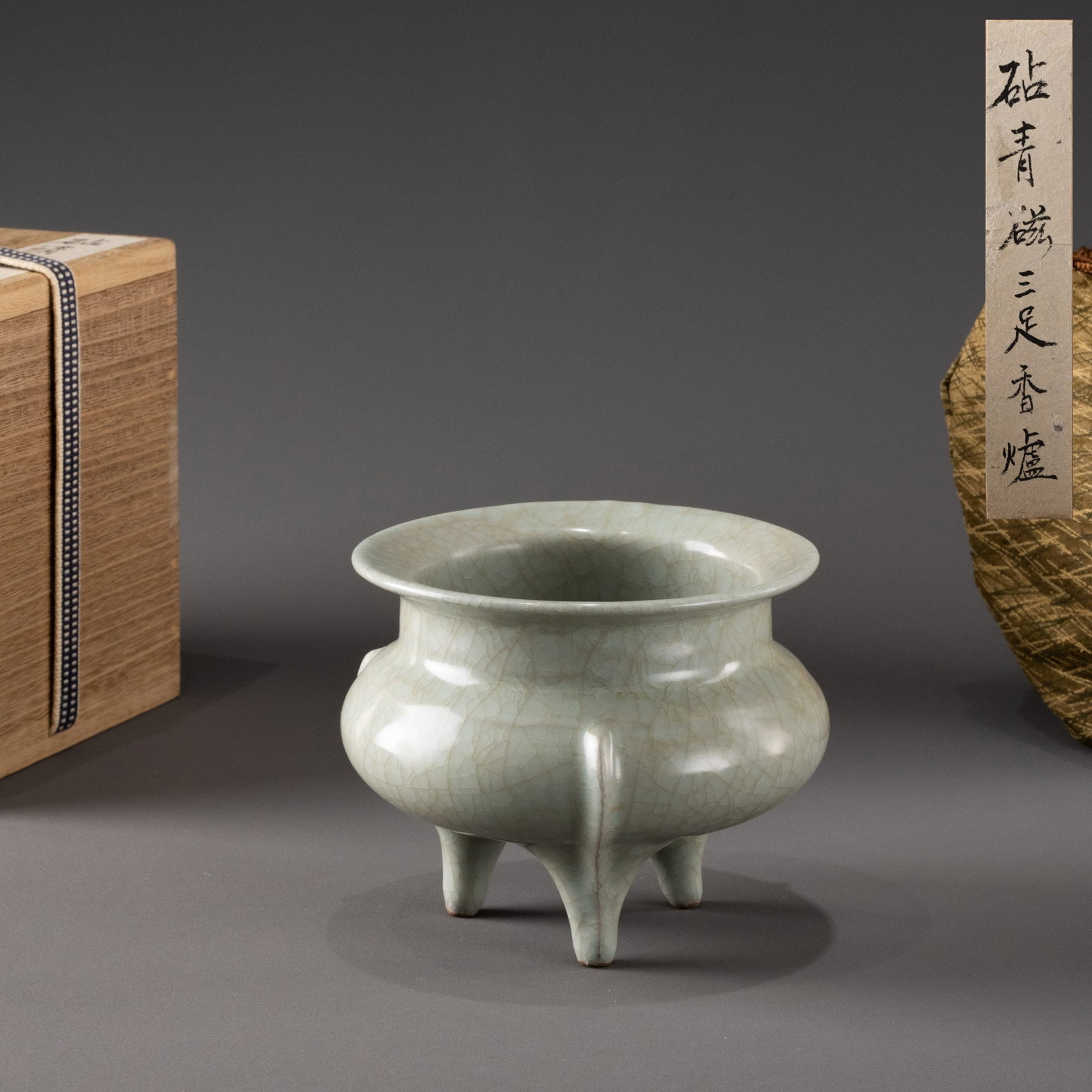 Song Dynasty Longquan kiln anvil green porcelain three-legged incense burner (1 of 8)