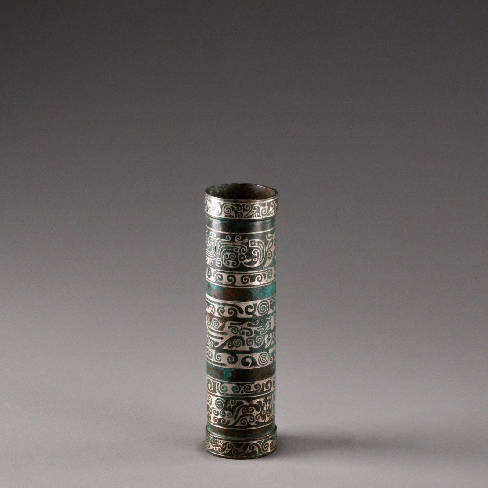 Warring States Period Bronze Chariot and Horse Parts with Silver Inlay and Taotie Design: H: 18cm W: 4.8cm