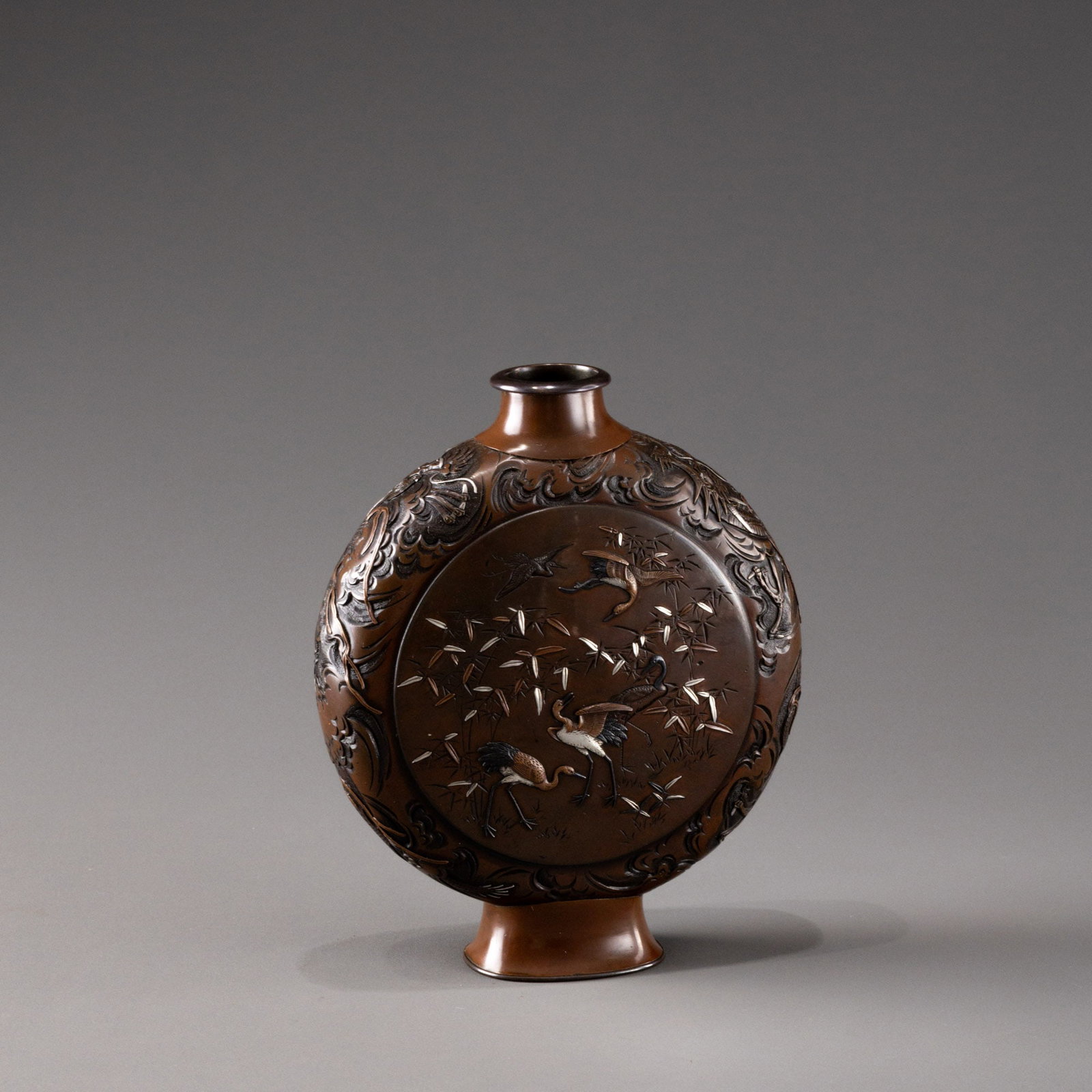 Flat bronze vase with gold and silver inlaid dragon design, made by Watanabe Atsuyoshi: H: 19cm W: 15cm