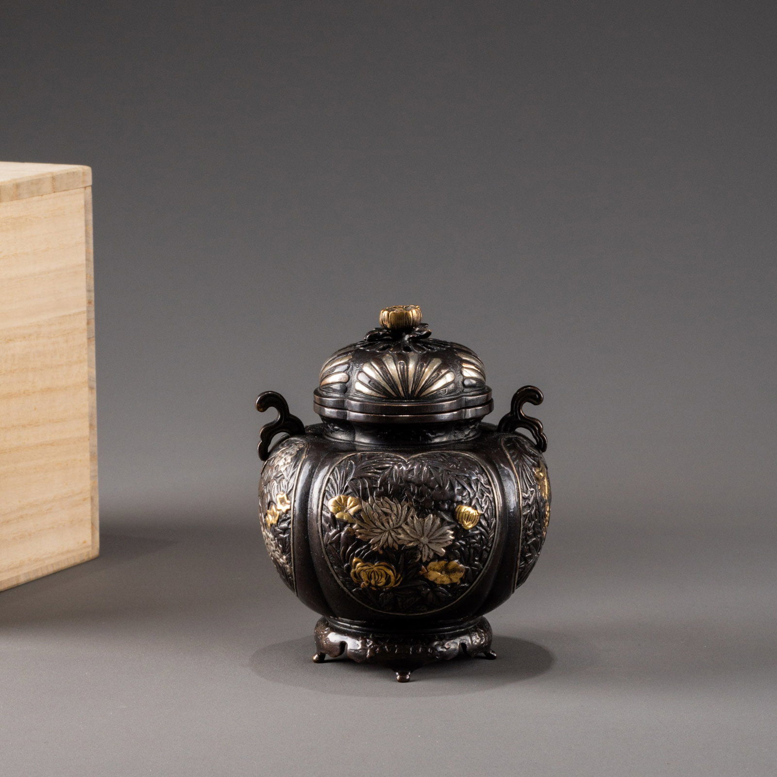 Bronze incense burner with gold and silver inlaid four-season floral design, signed Omine: H: 12cm W: 9cm