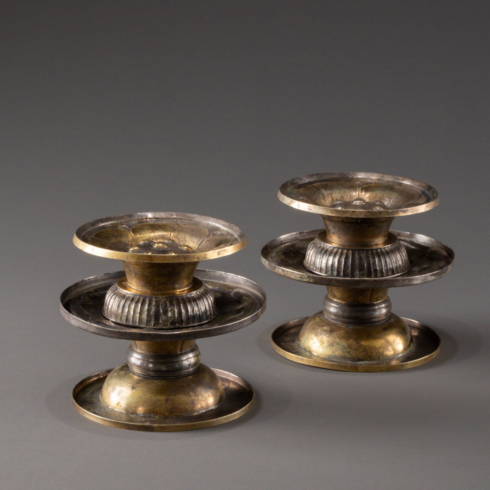 A pair of Tang Dynasty silver gilt lotus pattern incense burners: W: 13cm H: 11.5cm Weight: 391g x 2