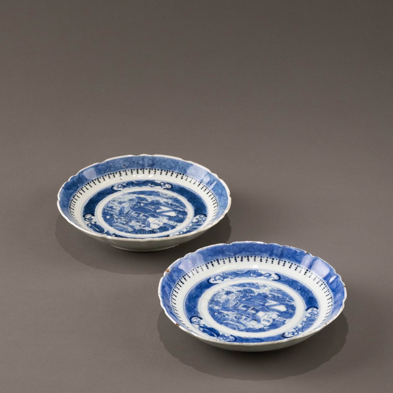 A pair of Qing Dynasty blue and white porcelain plates with garden and pavilion designs. (1 of 9)