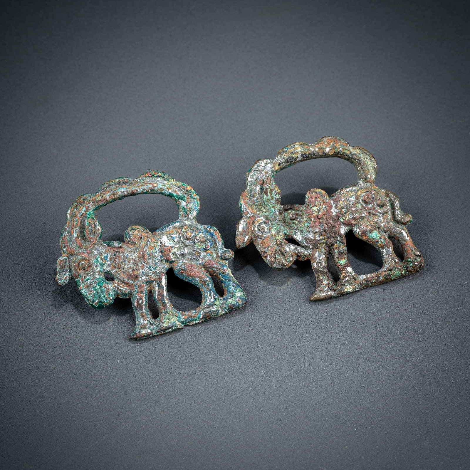 Two Han Dynasty Ordos bronze ornaments: L: 3.5cm W: 3.5cm x2