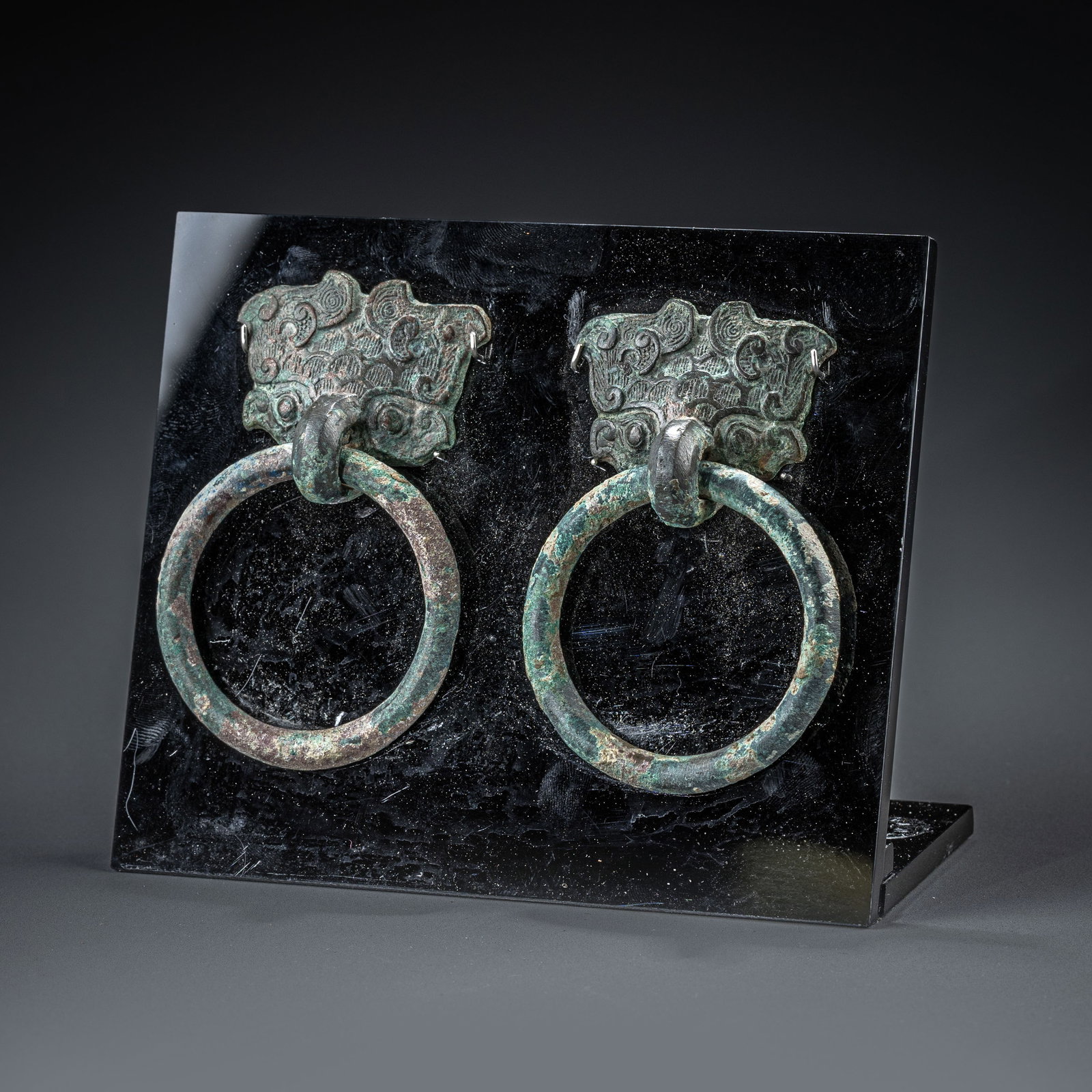 A pair of Han Dynasty Taotie door knockers: H: 9cm W: 6cm x2
