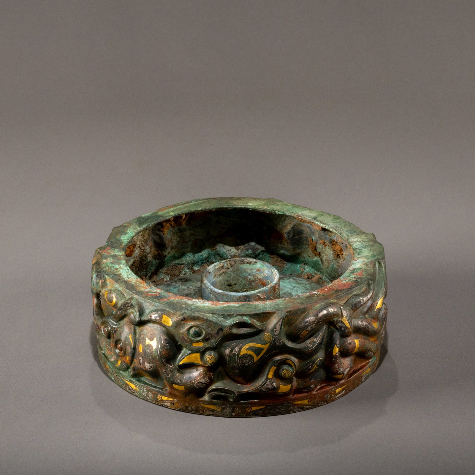 Han Dynasty Bronze Lamp Plate with Gilded and Silver Auspicious Beast Design: D: 16cm H: 6.3cm
