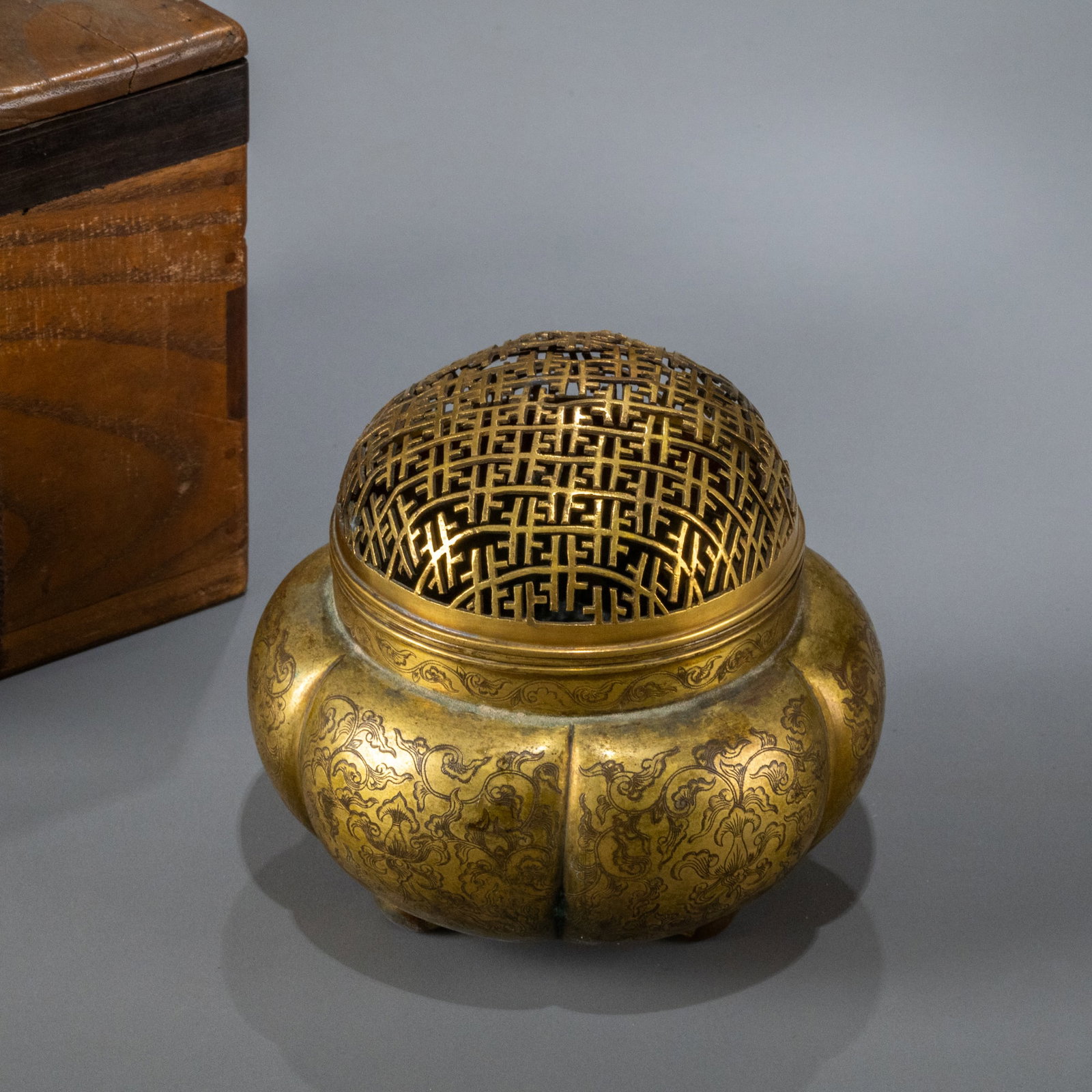 Tang Dynasty Gilt Bronze Melon-Shaped Tripod Censer with Tang Dynasty Floral Pattern: W: 13cm H: 11cm