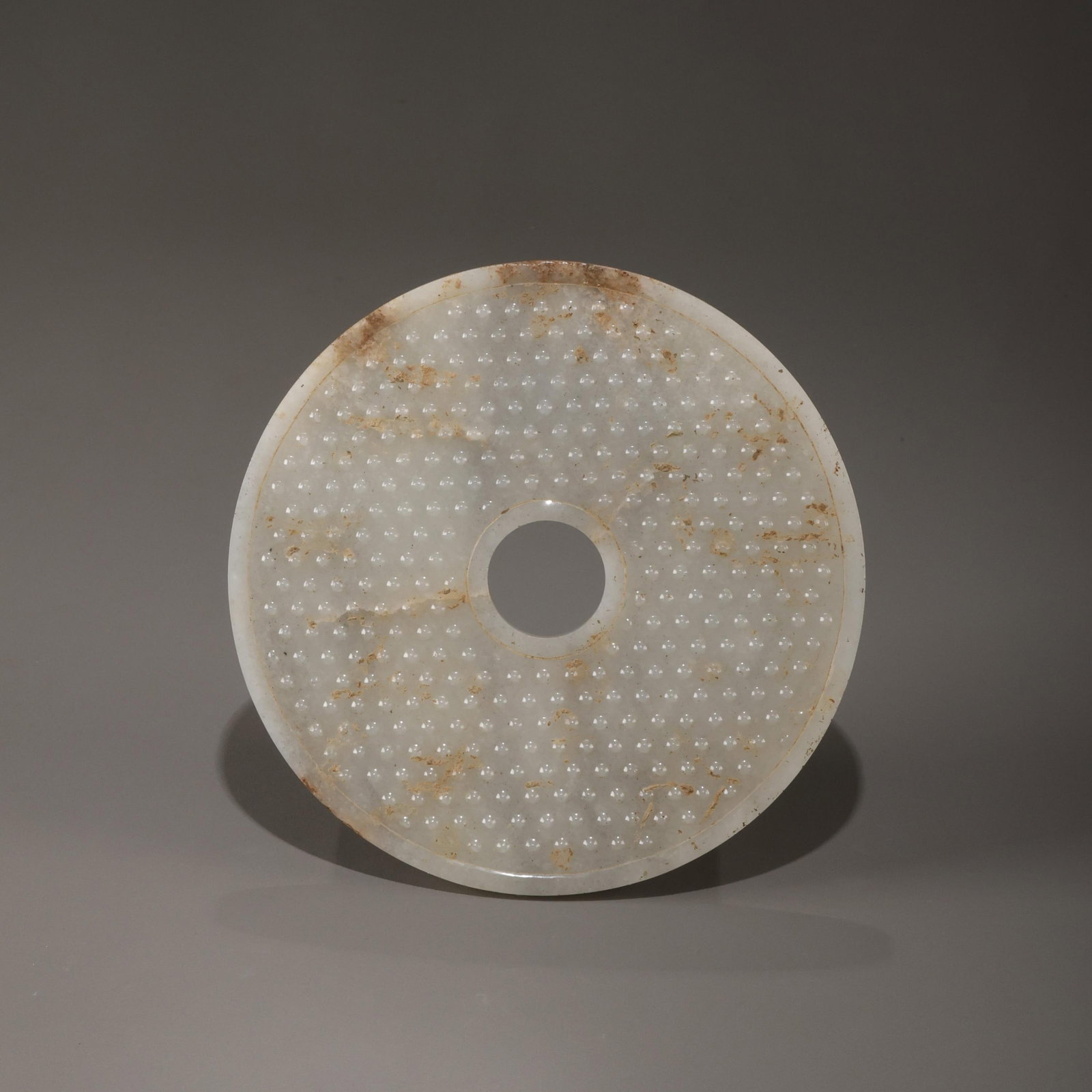 Han Dynasty jade bi disc with nipple-shaped studs: D: 15.7cm H: 0.5cm