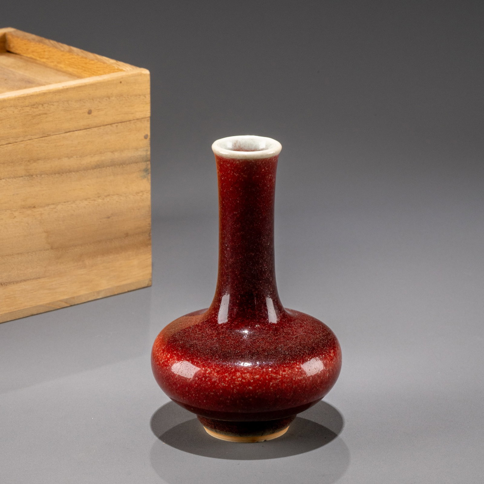 Qing Dynasty, Kangxi period, Langyao red-glazed water chestnut bottle: H: 11.5cm W: 7.5cm
