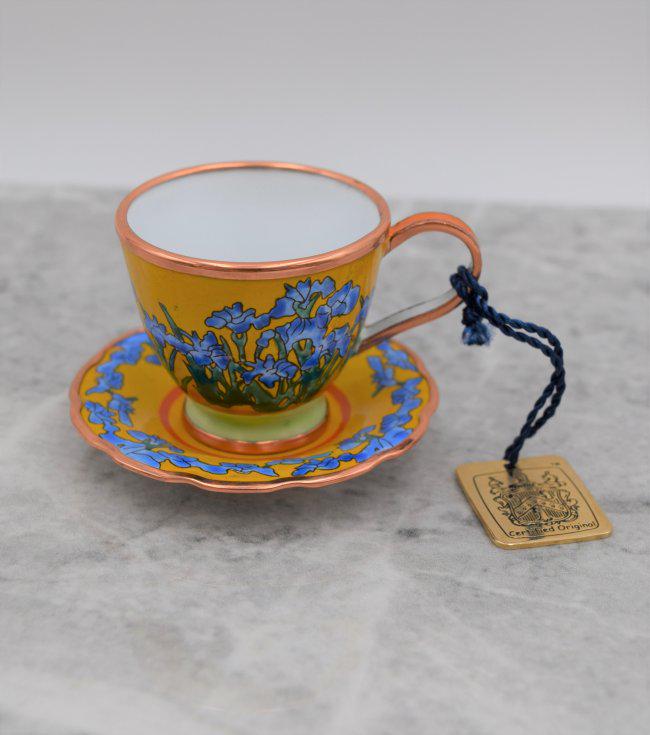 Charlotte Di Vita Flowers Tea Cup, Saucer (#012): This is a vintage Charlotte Di Vita Yellow and Blue Flowers Collectible Tea Cup with Saucer. Hand painted enamel. Edition number 012. Copyright 2004. You are bidding on the tea cup with the saucer pla
