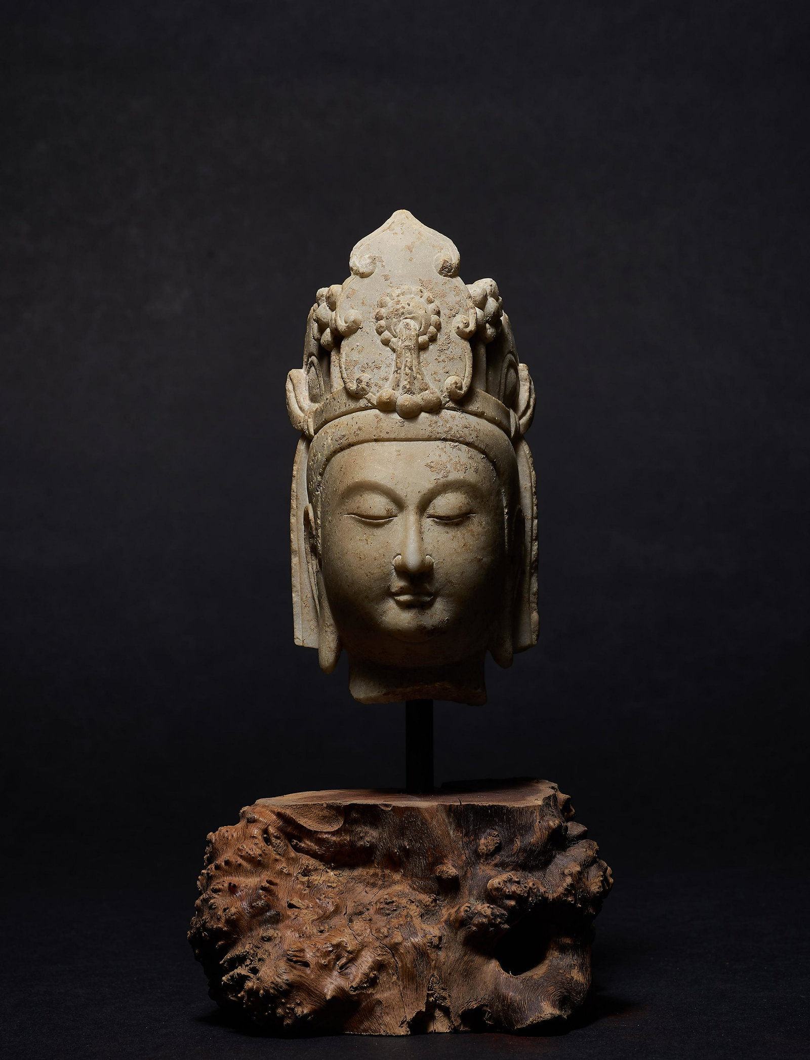 China, The Northern Qi Dynasty, Stone Buddhist Head: H. 12 cm.W. 7 cm.Weight 557 gram.