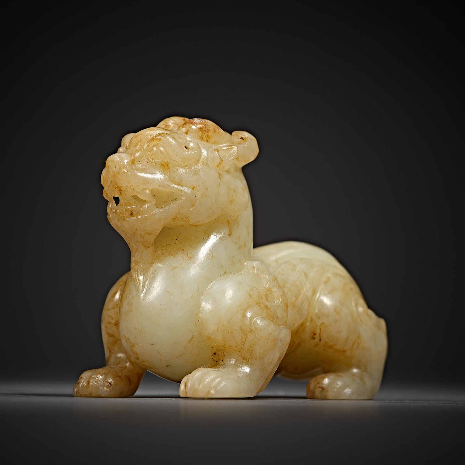 China, Han Dynasty, Hetian Jade, Beast: H. 4.5 cm.W. 6 cm.Weight. 89.5 gram.