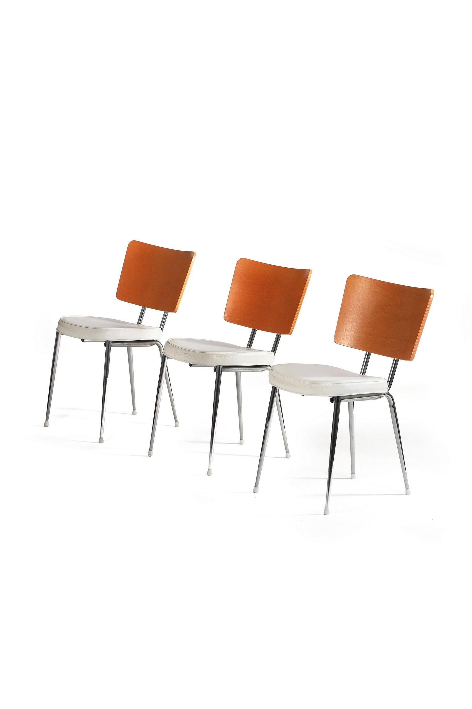 Philippe STARCK (1949): Suite de 4 chaises dites Lundi Ravioli Acier, skaï, bois lamellé collé 81 x 50 x 46 cm. X0, 1995 Référence : - Benedikt Taschen, Starck, Taschen, 2000, p. 432