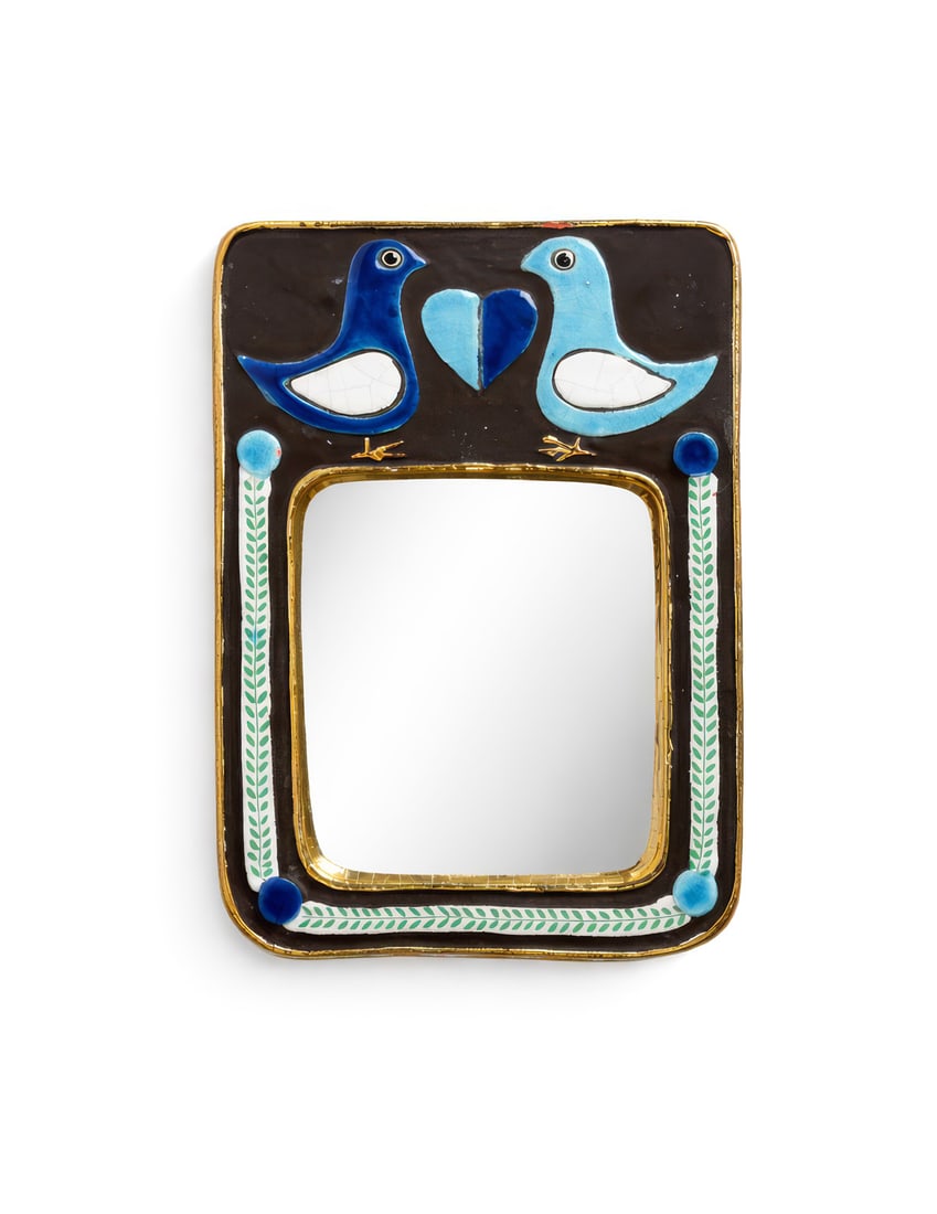 Mithé ESPELT (1923-2020): Miroir mural rectangulaire modèle ColombesÉpreuve en terre estampée et émaillée noir, bleu, blanc et or lisseH. : 25 cm. - L. : 18.5 cm. Bibliographie :- Antoine Candau, Mith&