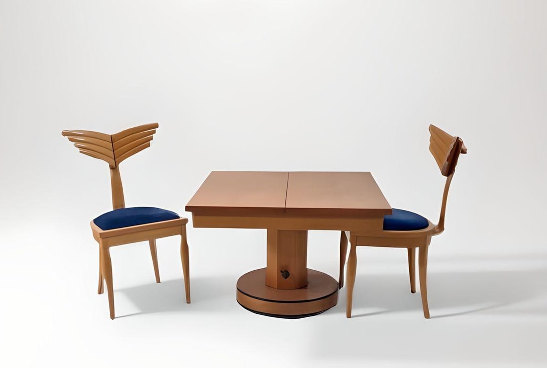 MASSIMO SCOLARI (1943): Ensemble comprenant deux chaises modèle Olympia, circa 19980, à assise en velours bleu disposé sur une structure en hêtre formant un dossier ailé et un piètement quadripo