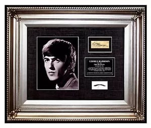 The Beatles George Harrison Hair Lock with Signed Photo Music Memorabilia: This lot includes:Gallery COA & free domestic shipping (*insurance and international shipping for an additional charge)Title: George Harrison's Lock of hairMedium: MemorabiliaFramed: 22 ¼" X 19