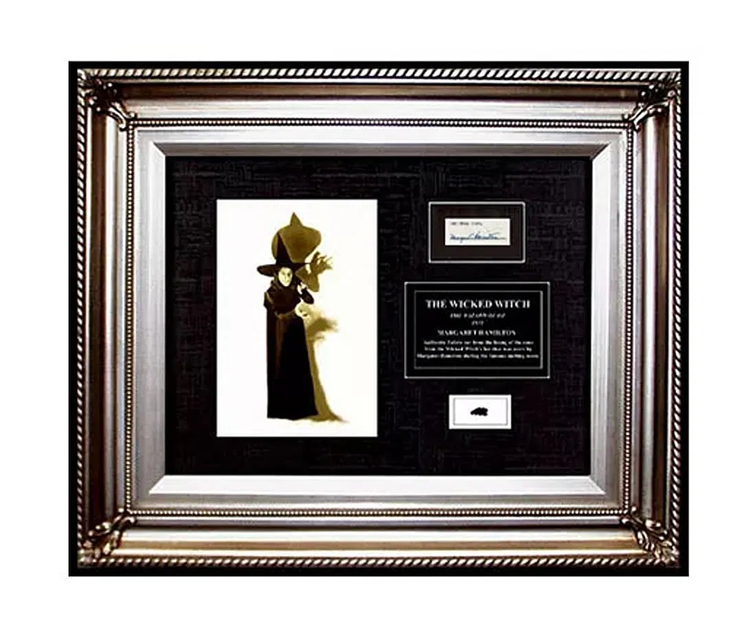 Wizard Of Oz Signed Wicked Witch Costume Movie Prop Photo Memorabilia Art: This lot includes: Gallery COA & In-house Shipping (*insurance and international shipping for an additional charge) Title: WIZARD OF OZ WICKED WITCH Medium: Signed Costume Movie Prop Framed: 23" X 19"