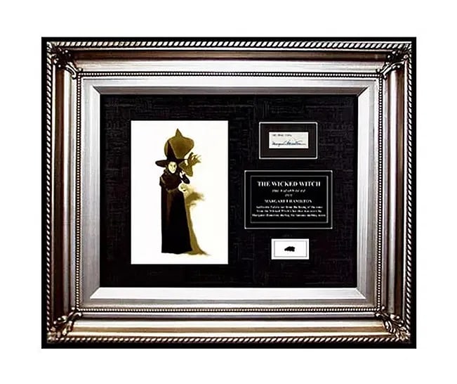Wizard Of Oz Wicked Witch Signed Costume Movie Prop COA Photo Memorabilia Relic: This lot includes:Gallery COA. In-house shipping available (insurance and international shipping for an additional charge).Title: WIZARD OF OZ WICKED WITCHMedium: Signed Costume Movie PropFramed: 23"