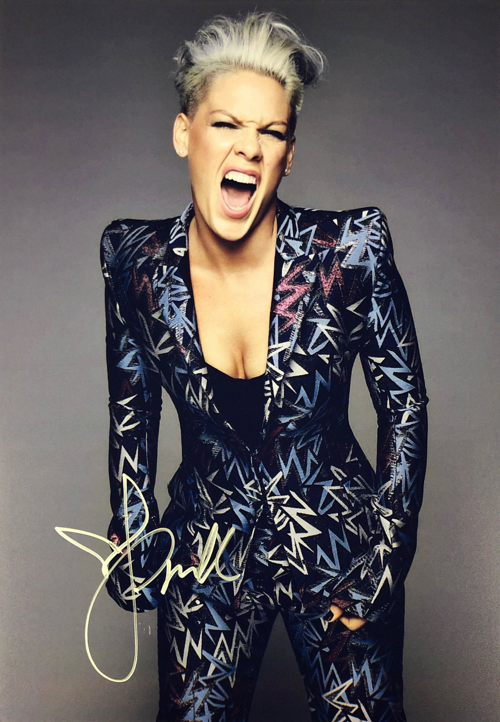 Pink Signed Photo: Autographed by:PinkAuthentication Code: PC26199Unframed Vertified and Excellent Condition Please kindly read our Terms and Conditions before bidding.