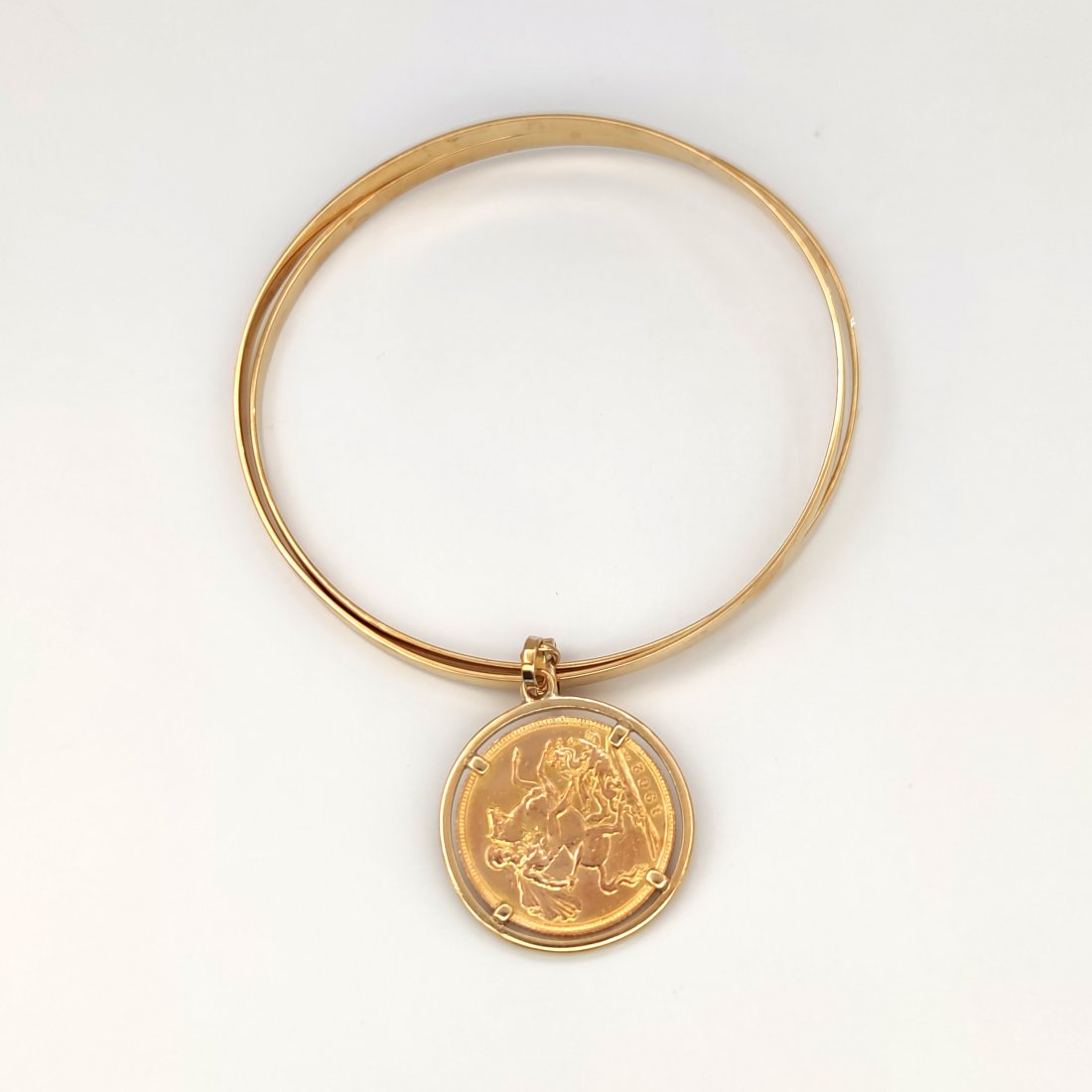 18 kt.Yellow gold - Bracelet, Pendant - 22 Kt Sterling: 18 kt.Yellow gold - Bracelet, Pendant - 22 Kt Sterling Size: Diameter 6.50 cm - Total weight: 27.16 g 18 kt and 22 kt yellow gold 7.98 gr. Punch present. Rigid link bracelets in 18 kt yellow gold with