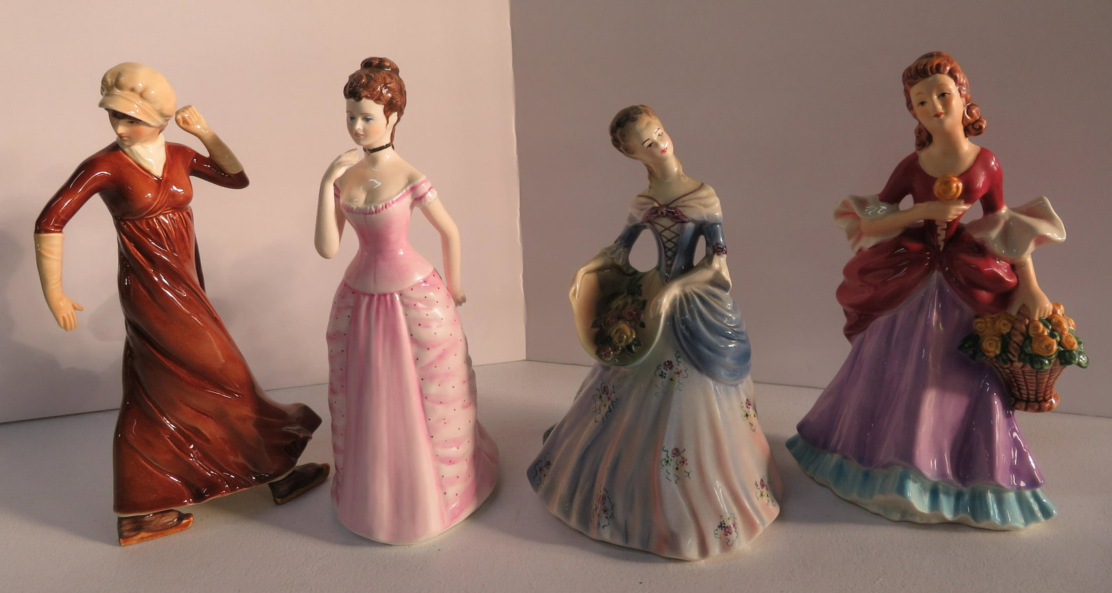 Lot of 4 Porcelain figure Lady Goebel Germany, Coalport: Lot of 4 Porcelain figure Lady Goebel Germany, Coalport England, good condition, about 8".